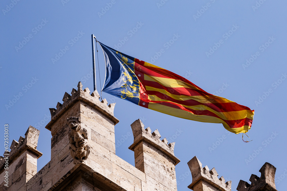 Flag of the Valencian country waving in La Lonja