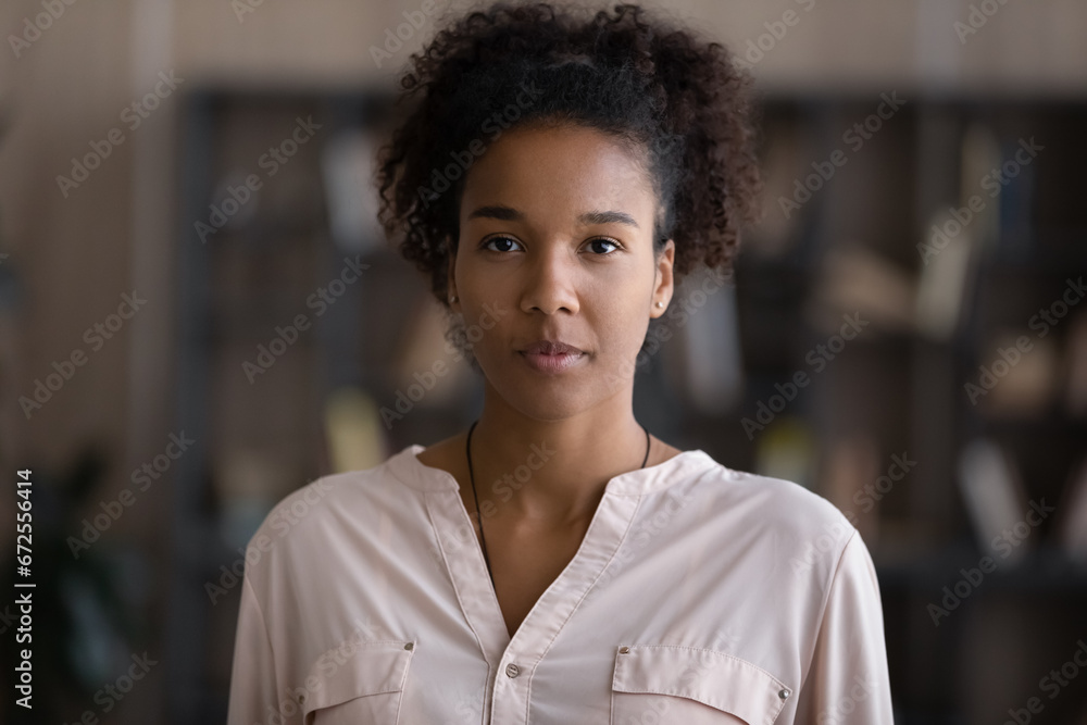 Head shot portrait of serious young African American woman, beautiful Black student girl in casual looking at camera. Millennial entrepreneur, modern female startup business leader profile picture - obrazy, fototapety, plakaty 