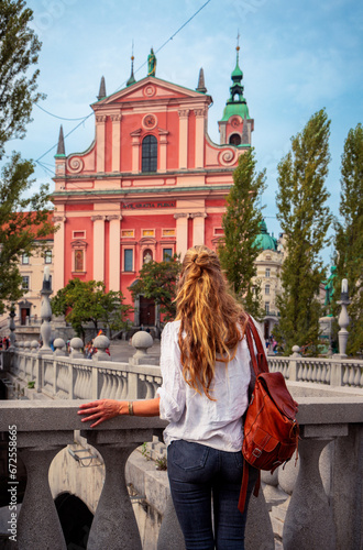 Rear view of woman visiting Ljubljana, capital city of Slovenia