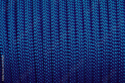 Climbing colorful blue rope as a background