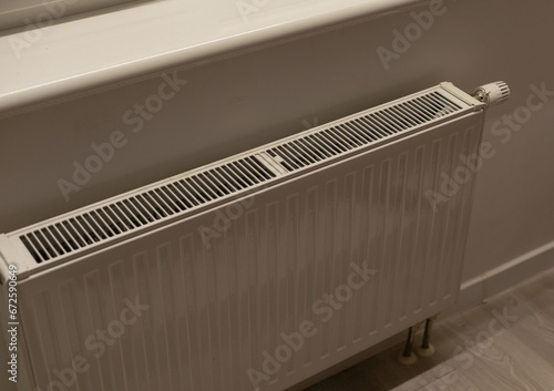 Wallpaper Mural Thermostatic radiator valve. A valve for regulating the radiator temperature. Controling the temperature of a room. Thermostat. White radioator valve set to highest temperature. Torontodigital.ca