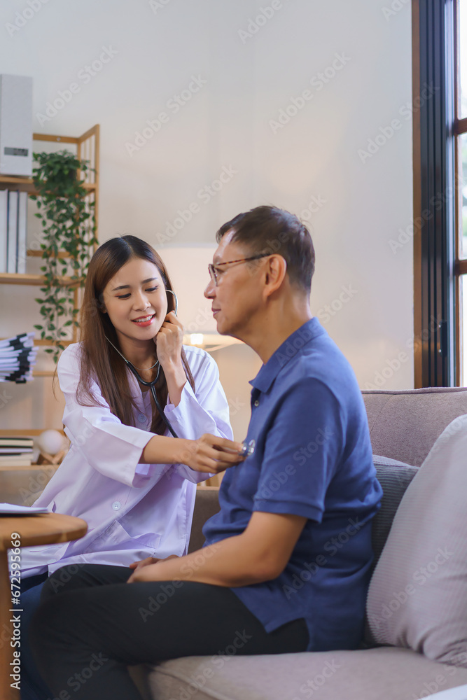 Healthcare concept, Woman caregiver checks and listening heart rate of senior man with stethoscope