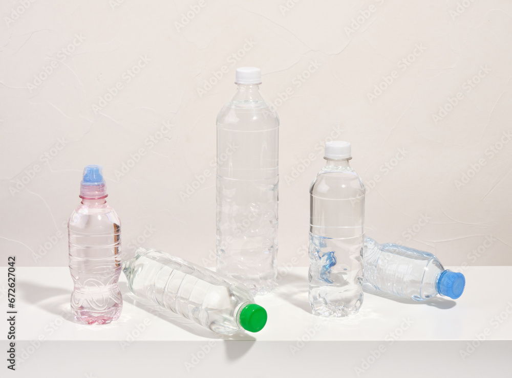 Plastic bottles with clean drinking water. Thirst and the lack of clean water.
