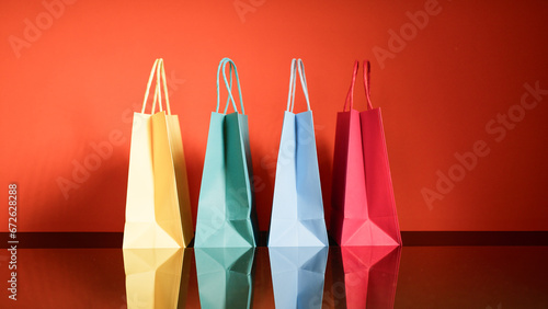 Shopping bags of various colors composition