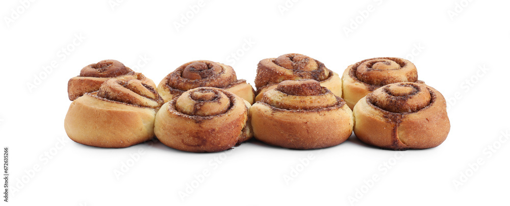 Many tasty cinnamon rolls isolated on white Many tasty cinnamon rolls isolated on white