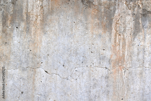Dirty distressed concrete wall texture background. Old rough and grunge texture wall. Texture of cement wall with black mold and stains. Abandoned building construction. 