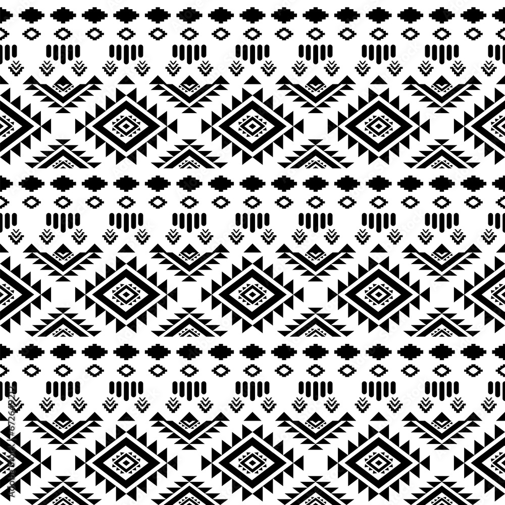 Fototapeta premium Ethnic southwest tribal Navajo ornamental seamless pattern fabric black and white design for textile printing