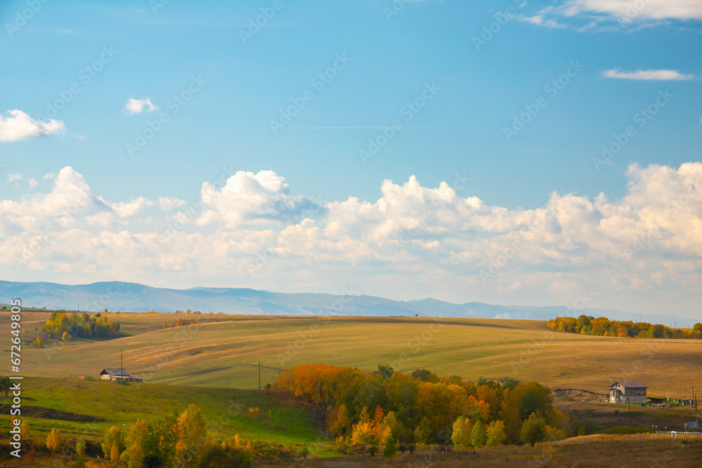 Fototapeta premium Autumn yellow and red landscape - hills