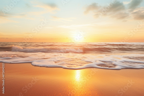 Golden Sunrise over Tranquil Sea with Waves Gently Caressing Sandy Shore