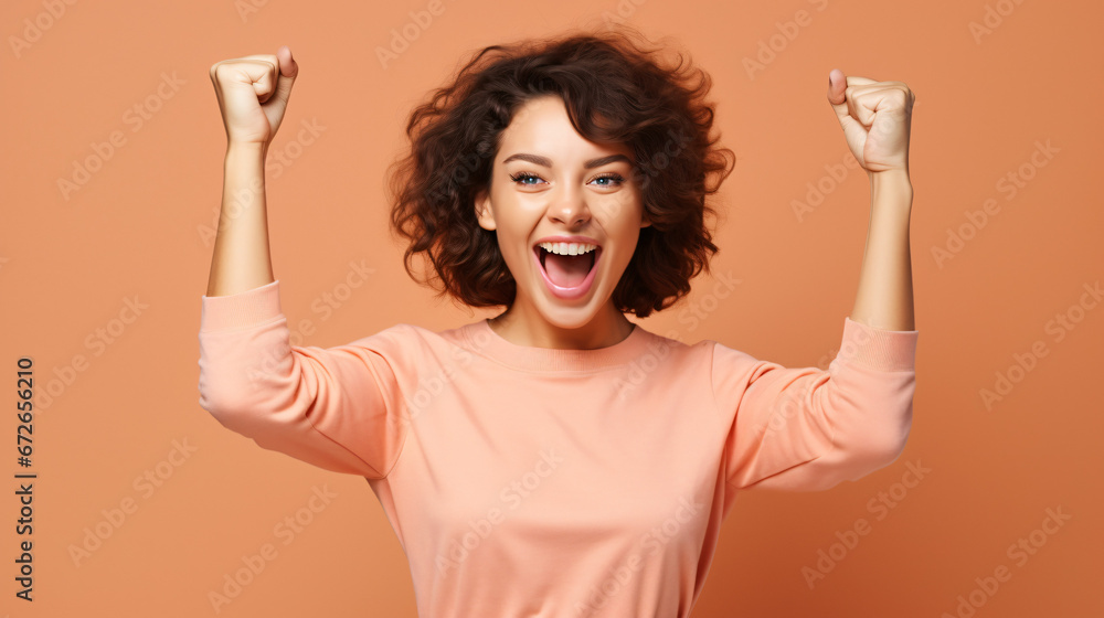 
Photo of cheerful overjoyed funny woman raise fists in victory see big bargains in phone isolated on beige color background - obrazy, fototapety, plakaty 