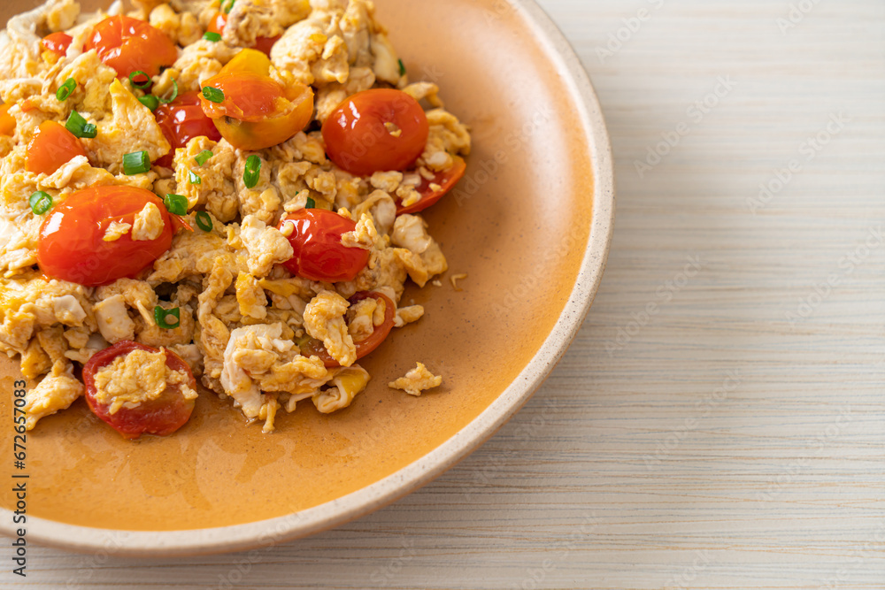 stir-fried tomatoes with egg on plate stir-fried tomatoes with egg on plate