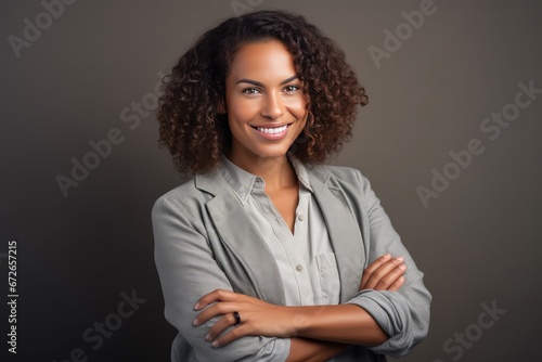 beautiful and joyful smiling female model portrait on gray background