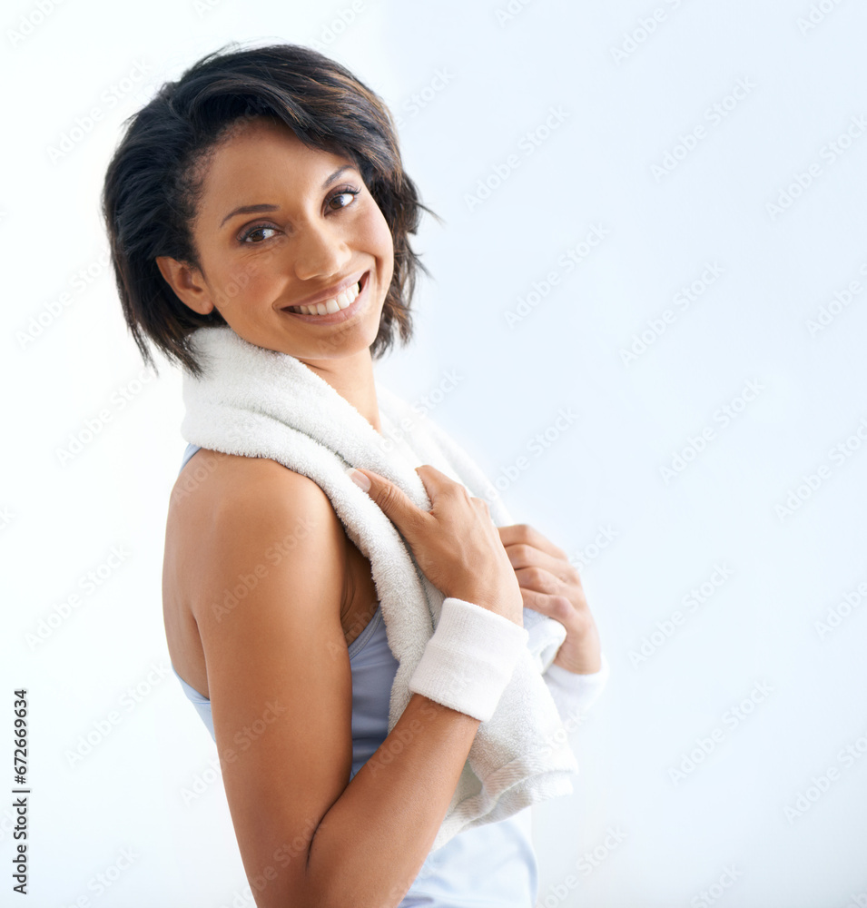 Happiness, fitness portrait and woman with towel for sweat after exercise, pilates workout or yoga aerobics. Sports athlete, active studio training and model smile for challenge on white background Happiness, fitness portrait and woman with towel for sweat after exercise, pilates workout or yoga aerobics. Sports athlete, active studio training and model smile for challenge on white background