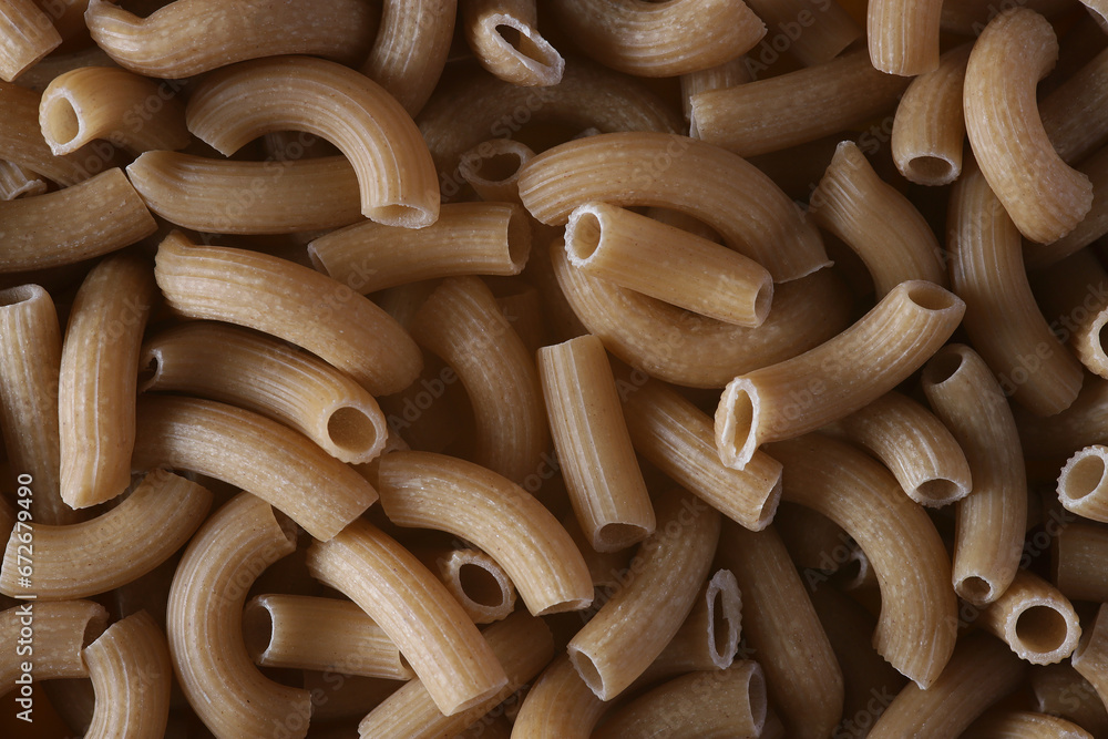 Close up image of brown lentil fusilli pasta. Top view. Close up image of brown lentil fusilli pasta. Top view.