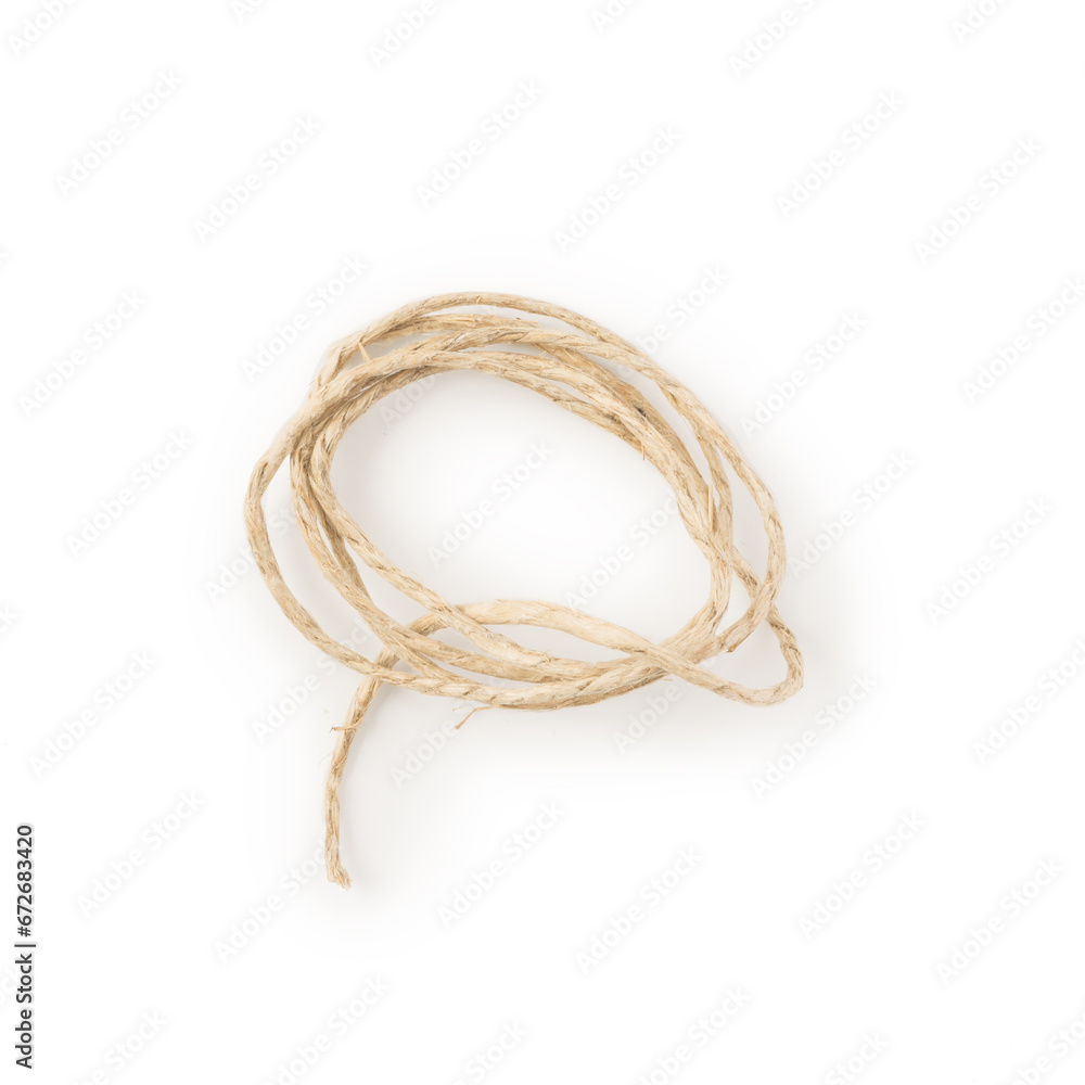 Twisted natural thin rope on white background Twisted natural thin rope on white background