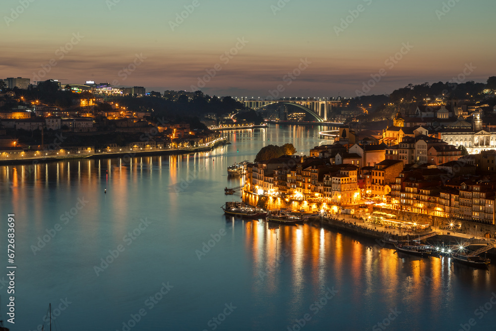 View of the Douro river and the city of Porto at sunset in autumn in Portugal