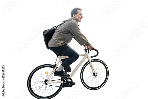 A male cyclist rides a bicycle with a bag going to the office to work eco transport for the city . Transparent isolated background.p