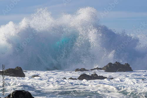 large waves hitting the volcanic rocks with force, on the north coast of Tenerife, Canary islands photo