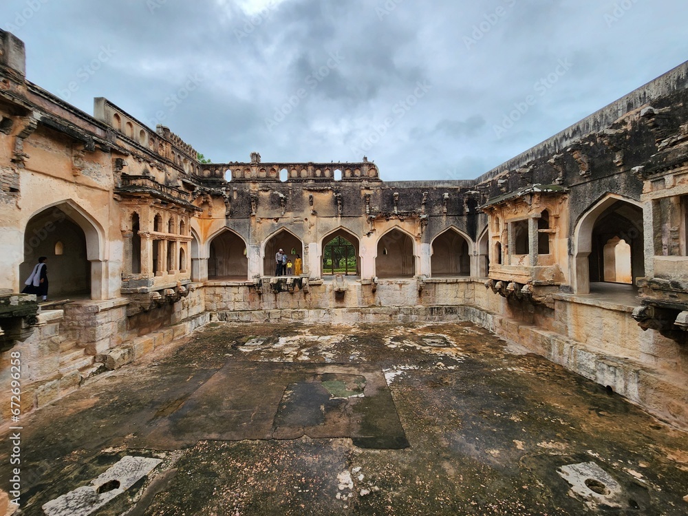 Hampi, Karnataka India - July 24 2023: Ruins of Queen's bath in the ancient royal enclave at Hampi.
