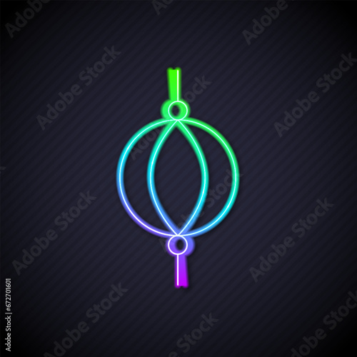 Glowing neon line Punching bag icon isolated on black background. Vector