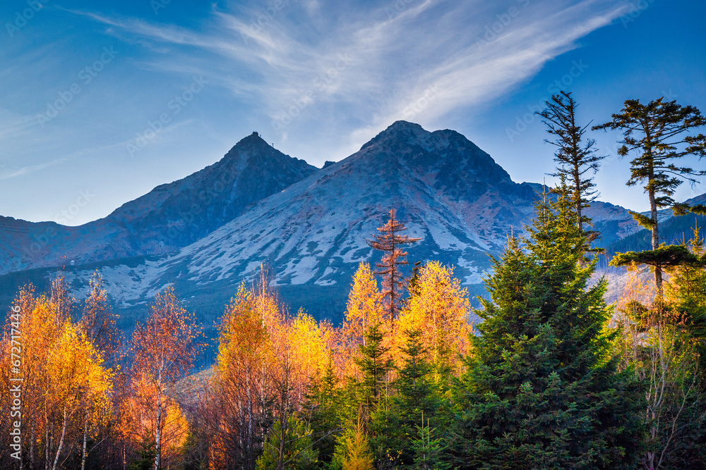Lomnica Peak at sunset in autumn season. The second highest peak of the High Tatras mountains of Slovakia, Europe.