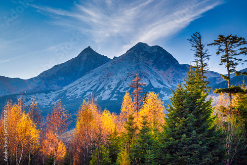 Lomnica Peak at sunset in autumn season. The second highest peak of the High Tatras mountains of Slovakia, Europe.
