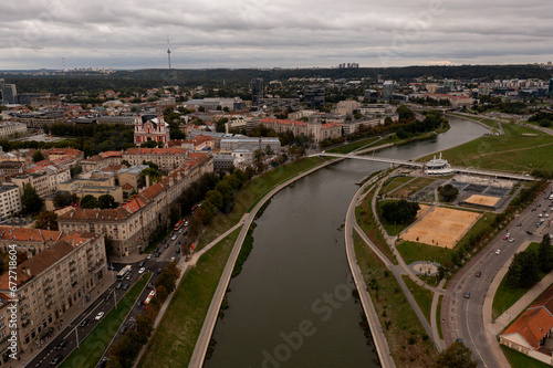 Drone photography of river and cityscape with parks and buildings