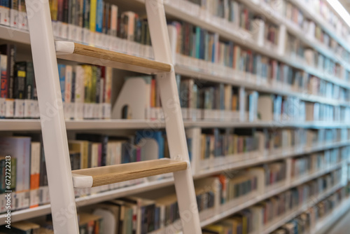 Photography Library staircase with blur multiple books on shelf