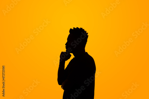 silhouette of a person thinking