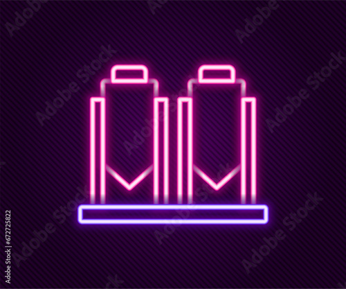 Glowing neon line Traditional brewing vessels in brewery icon isolated on black background. Beer brewing process. Distillery plant, brewery. Colorful outline concept. Vector
