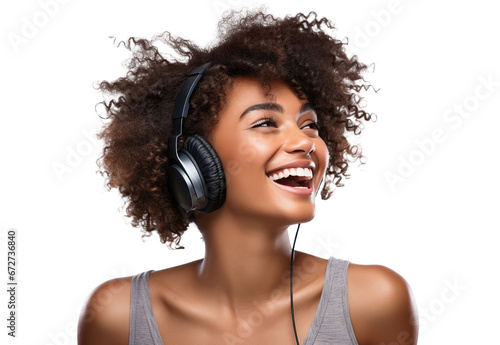 Young African American woman, passionate about music, revelling in the beats and rhythms flowing through her headphones, cut out photo