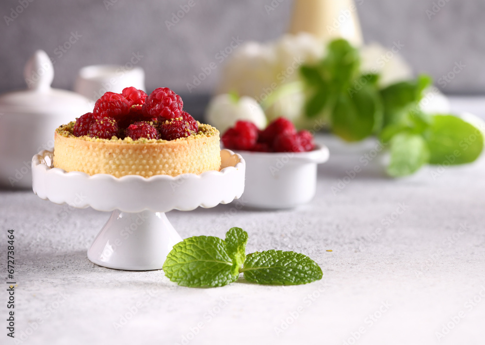 tartlets with fresh raspberries for dessert - obrazy, fototapety, plakaty 