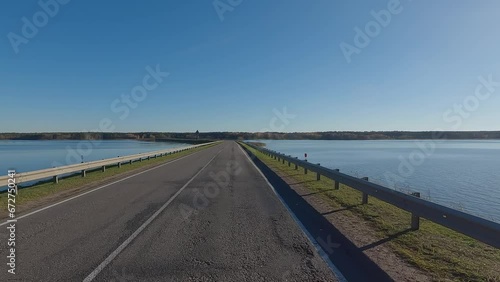 Wallpaper Mural The car drives along the road on a autumn day. Highways, roadside and road line markings. Torontodigital.ca