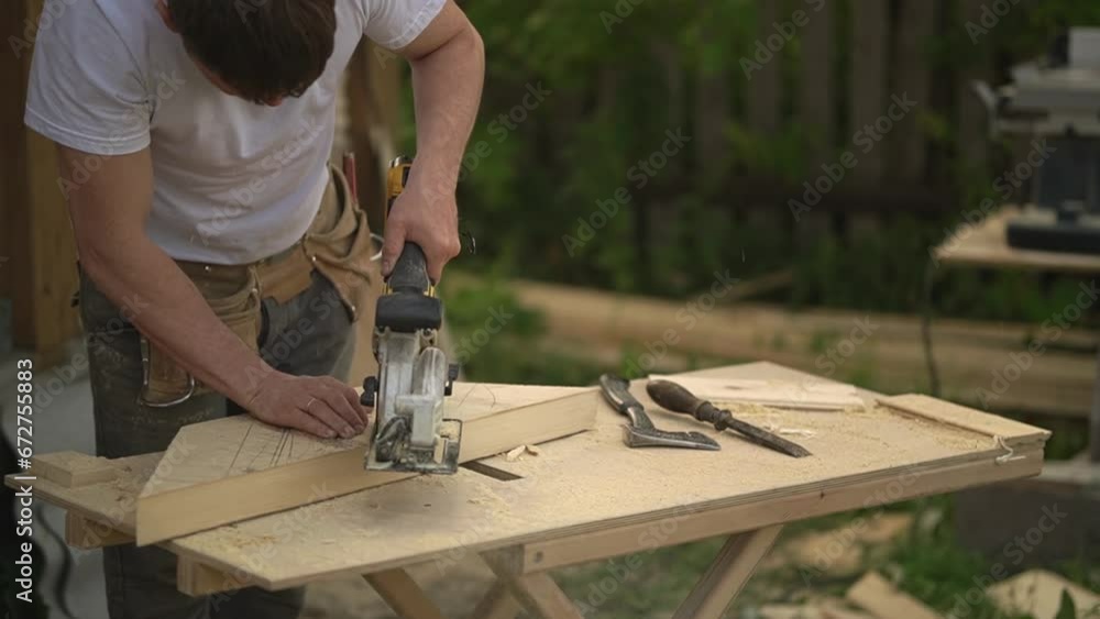 wood processing. a man works with an electric tool. High quality video in FullHD format. wood processing. a man works with an electric tool. High quality video in FullHD format.