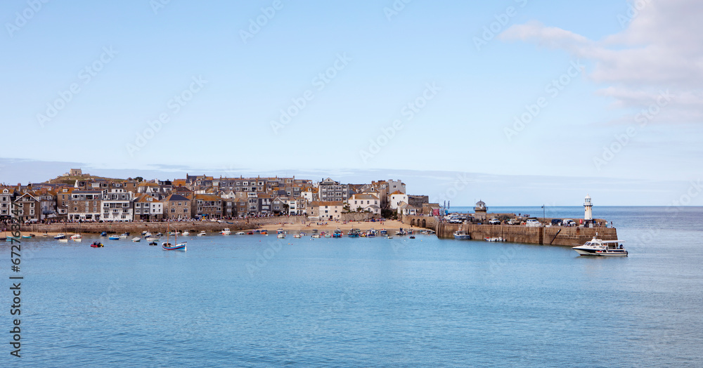 A view of St Ives seaside town from a cliff along the Cornish coast.