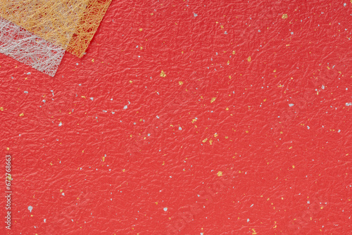 赤いもみ和紙に金銀の柄の背景