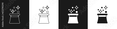 Set Magician hat icon isolated on black and white background. Magic trick. Mystery entertainment concept. Vector
