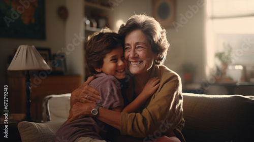 A boy hugs his grandmother.
