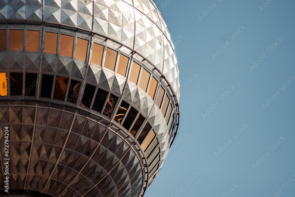 the top of an industrial tower, with a mirror in it