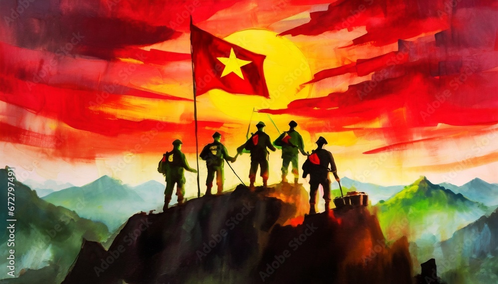 Silhouettes of soldiers placing Vietnam national flag on the peak of a mountain