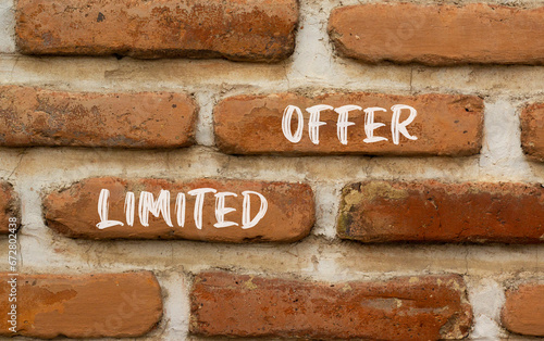 Limited offer symbol. Concept words Limited offer on beautiful brown bricks. Beautiful brick wall background. Beautiful brick wall. Business marketing, motivational Limited offer concept. Copy space.