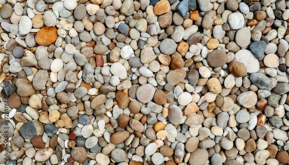 Colorful sea stones on the beach texture background