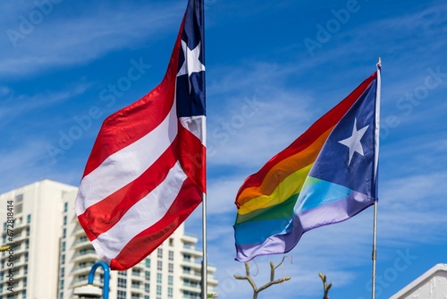 Flag of texas and the flag of texas and the rainbow flag waving