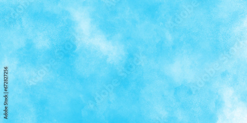 soft and lovely sky blue watercolor background with clouds, Sky clouds with brush painted blue watercolor texture, small and large clouds alternating and moving slowly on cloudy winter morning sky.