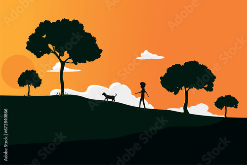 boy walking with his dog at sunset