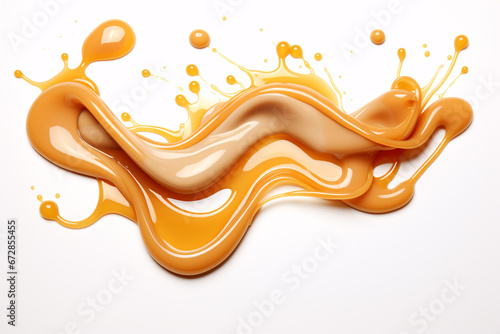 Aclustered display of saliferous caramels with a creamy trickle of sauce droplets is pictured against a plain white surround.