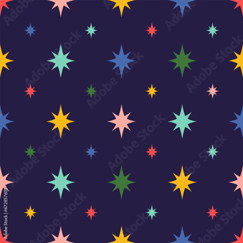 Colorful star seamless pattern on dark blue background. Vector Mid Century Christmas vector repeat print. Bright starburst fabric, wallpaper, textile, surface design, package, wrap paper.