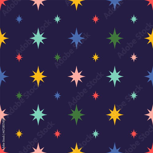 Colorful star seamless pattern on dark blue background. Vector Mid Century Christmas vector repeat print. Bright starburst fabric  wallpaper  textile  surface design  package  wrap paper.