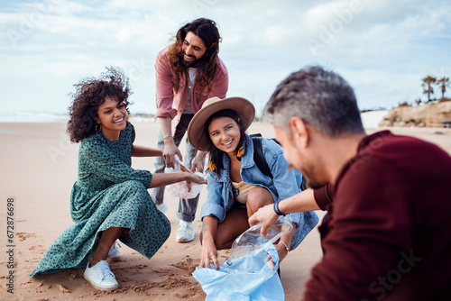 Friends cleaning the beach on vacation