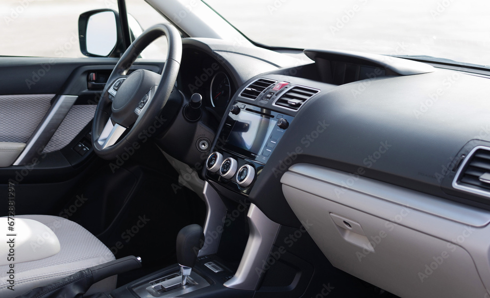 Automobile interior, inside vehicle grey panel and beige luxury salon.